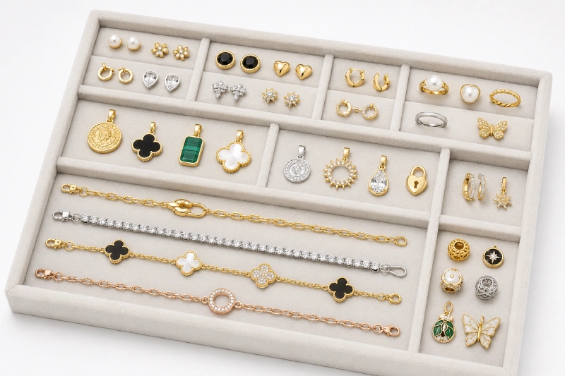 Custom jewelry samples, material components and packaging prepared for factory-direct manufacturing