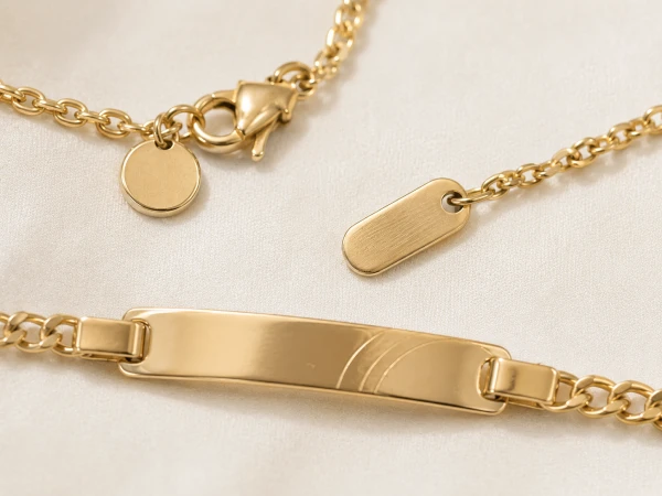 Close-up of a custom logo charm and branded bracelet tag